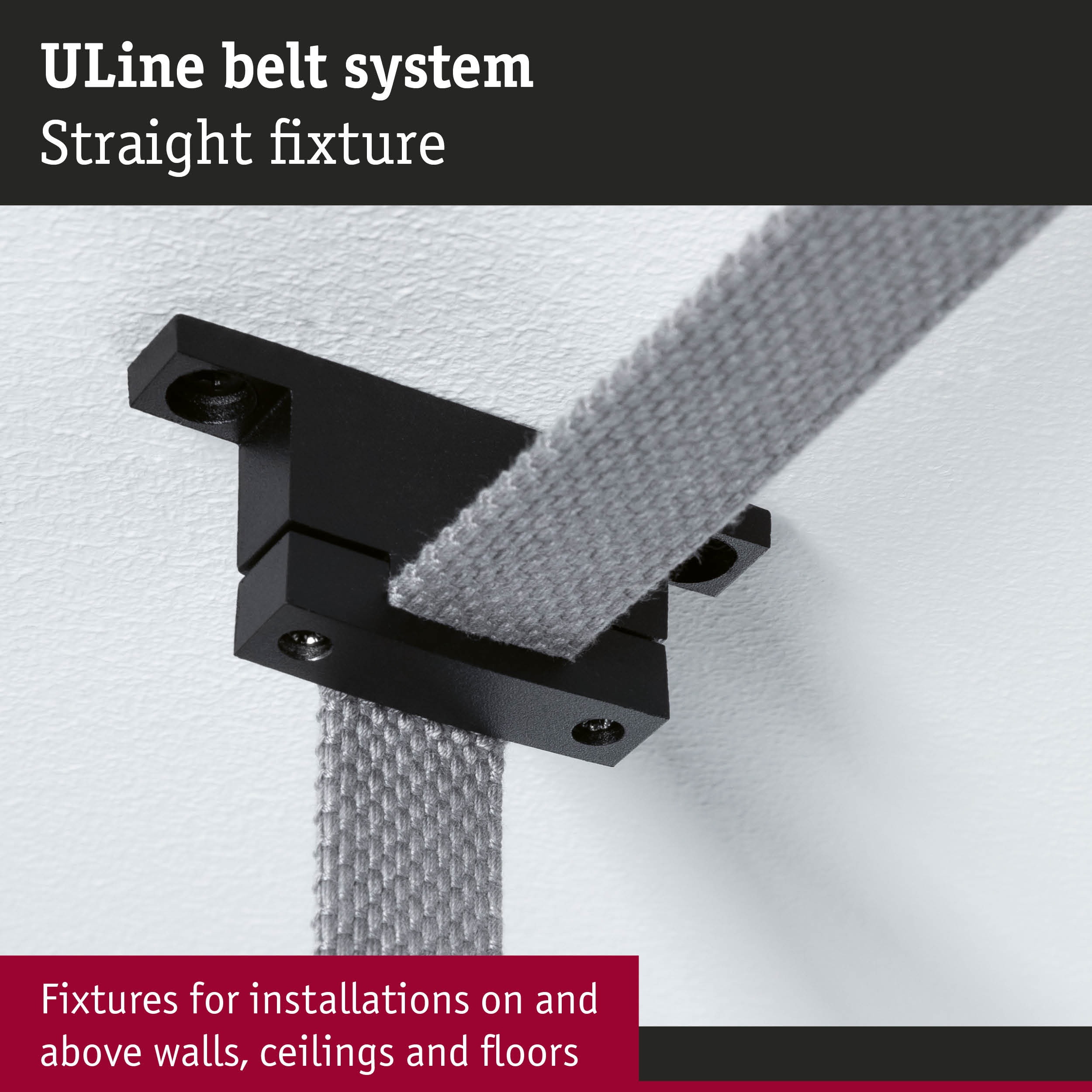 Black metal ULine belt fixture with grey textile strap mounted on white wall for lighting system