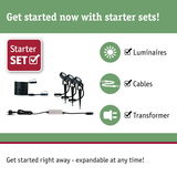 Starter set with black LED luminaires, cables, and transformer for expandable outdoor lighting