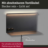 Schwarze Wandlampe mit abnehmbarem Textilkabel und warmweißem LED-Licht für einfache Montage