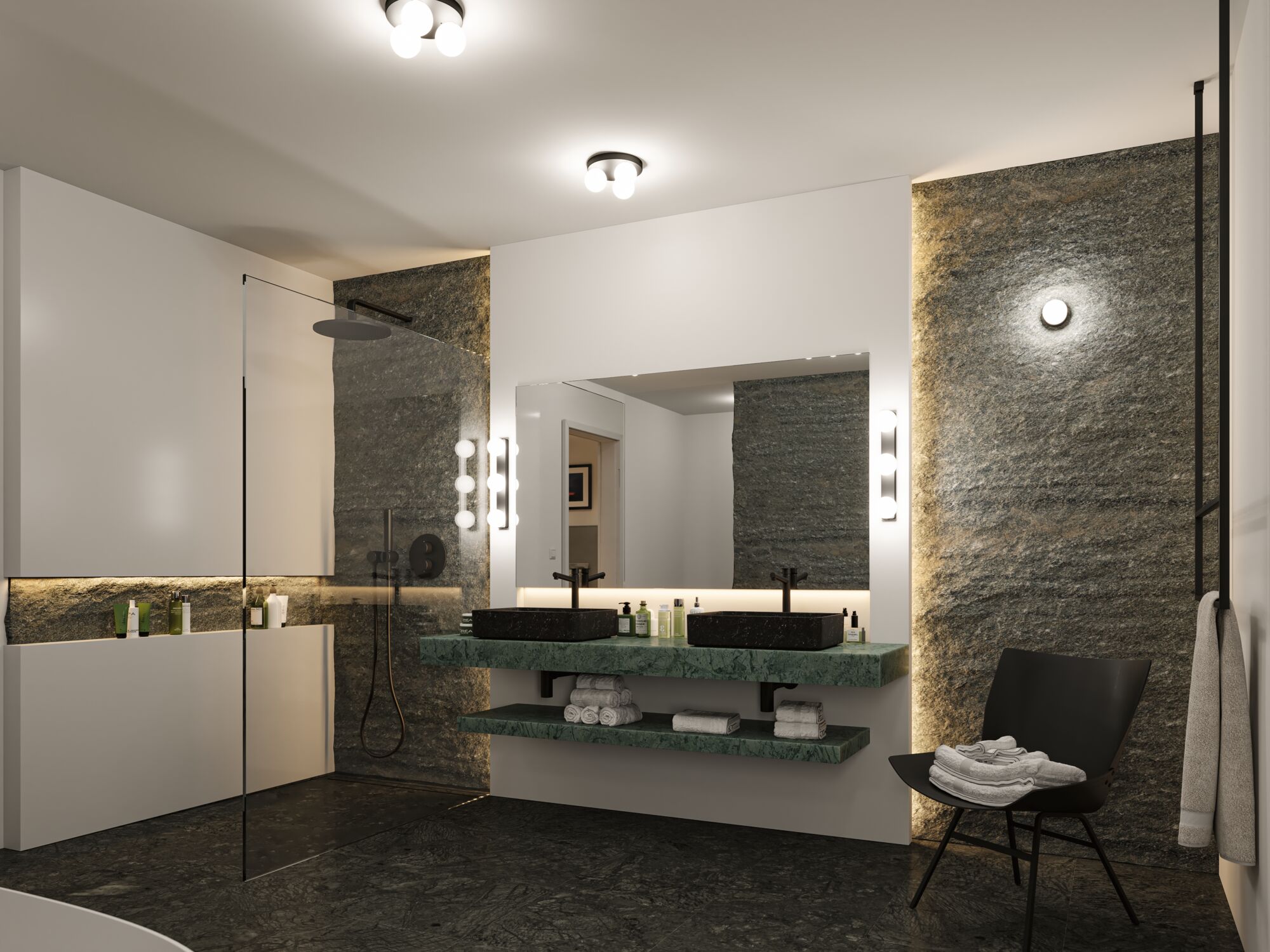 Moderne badkamer met groene marmeren wastafel, zwarte kranen en indirecte LED-verlichting.