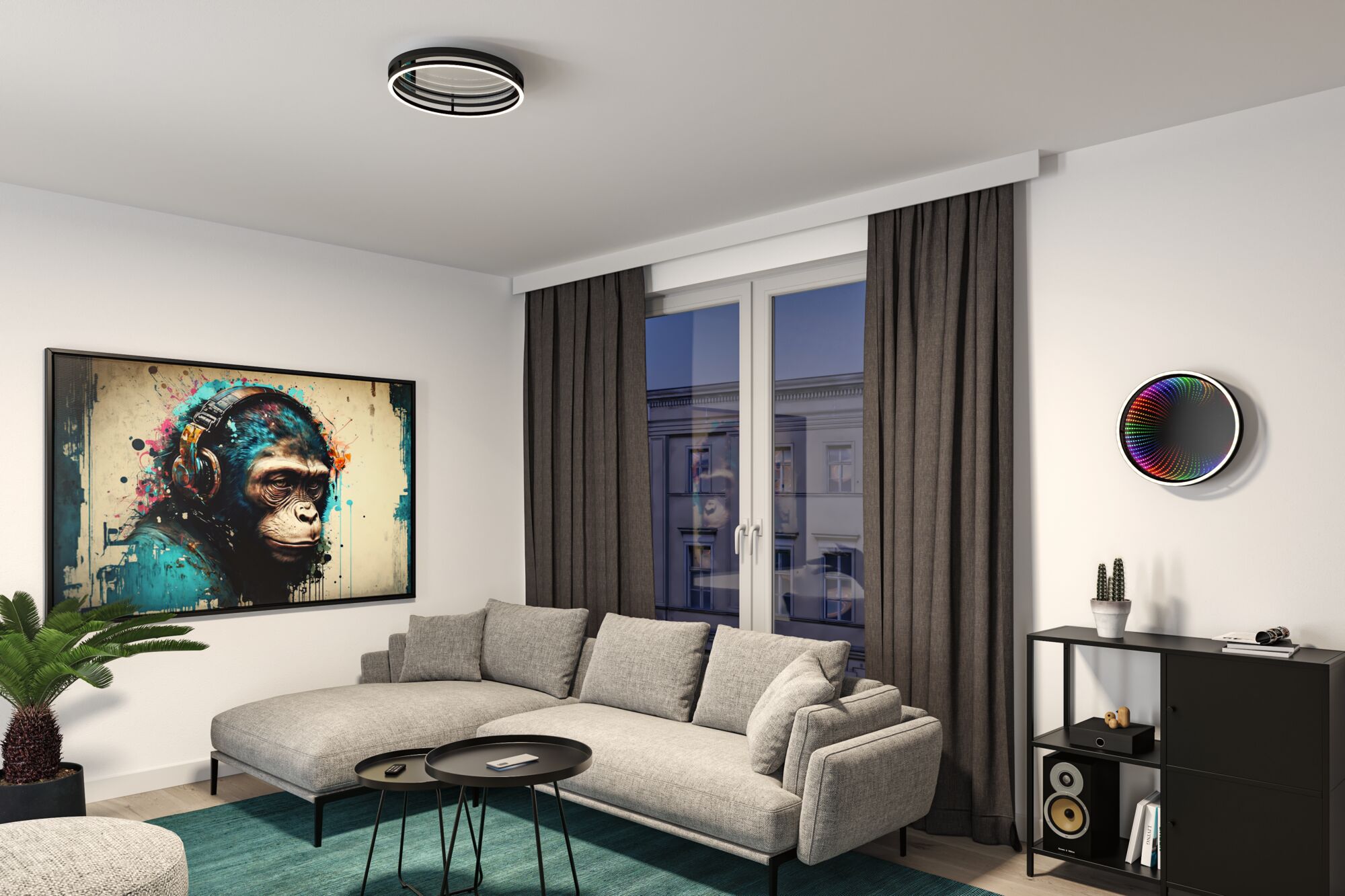 Modern living room with grey fabric sofa, black side tables, and round black-white LED ceiling light fixture.