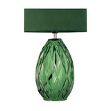 Green table lamp with textured glass base and green fabric shade for elegant home lighting