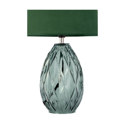 Table lamp with green fabric shade and textured emerald glass base for stylish home lighting