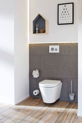 Modern white wall-mounted toilet with grey tiled wall and wood-look floor in stylish bathroom.