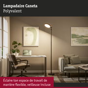 Lampadaire noir Caneta avec tête ronde dans un salon moderne avec espace de travail et canapé