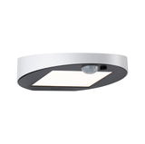 Round LED ceiling light in white and black with motion sensor for hallway and staircase lighting