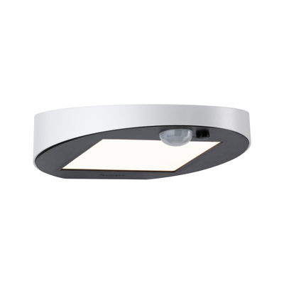 Round LED ceiling light in white and black with motion sensor for hallway and staircase lighting
