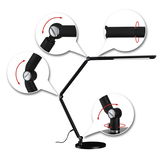 Lampe de bureau LED noire avec articulations réglables en métal pour un éclairage flexible.