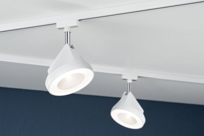 Two white LED ceiling spotlights in plastic on track system for modern room lighting
