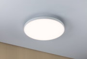 Runde weiße LED-Deckenleuchte mit mattem Rahmen an grauer Decke für modernes Raumlicht