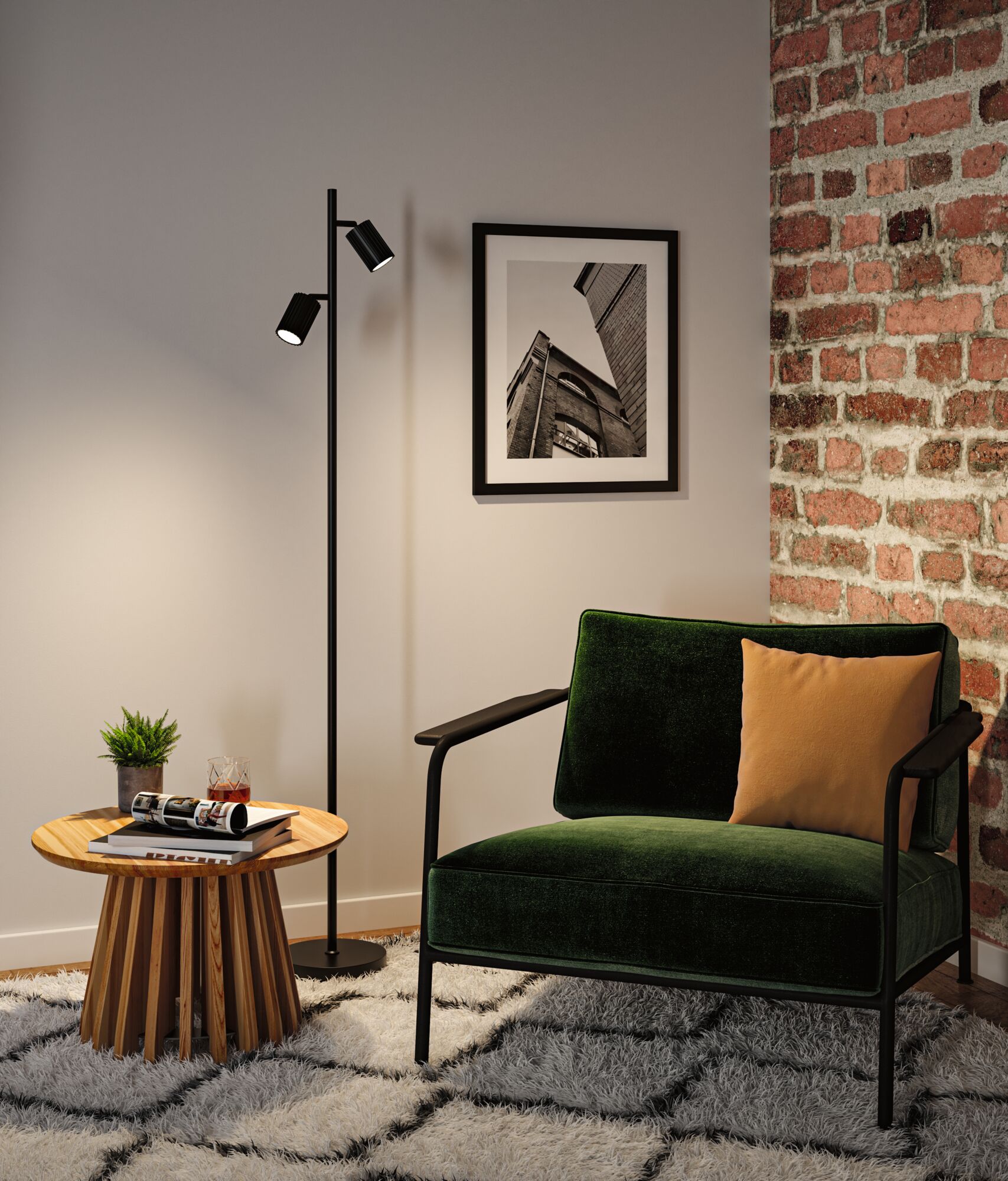 Schwarze Stehleuchte mit zwei verstellbaren Spots in modernem Wohnzimmer mit grünem Samtsessel