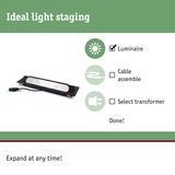 Black LED luminaire with cable connector on white background for lighting installation