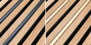Schwarzes LED-Lichtrohr auf hellem Holz mit warmweißem Licht für moderne Innenbeleuchtung