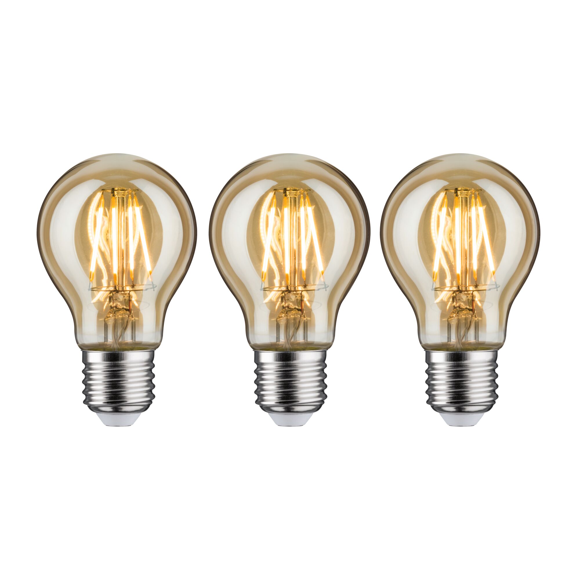 Three LED light bulbs with warm white light and transparent amber glass for energy-efficient lighting