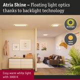 Living room with Atria Shine ceiling lights emitting cosy warm white light and modern decor