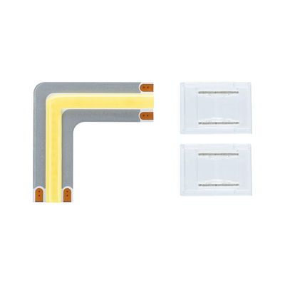 Connecteur d'angle LED avec bande lumineuse jaune et deux caches en plastique transparent pour bandes LED.