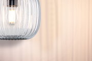Modern pendant lamp with ribbed clear glass and warm white LED bulb ideal for living room lighting