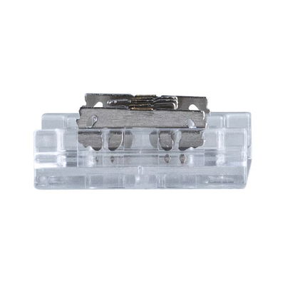 Small transparent plastic and metal component for electrical connections in lighting systems