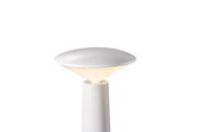 Modern white LED table lamp with round plastic shade for ambient lighting in living spaces