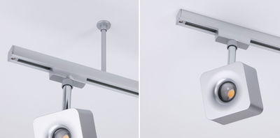 Modern square silver metal LED spotlight on track system for adjustable lighting solutions