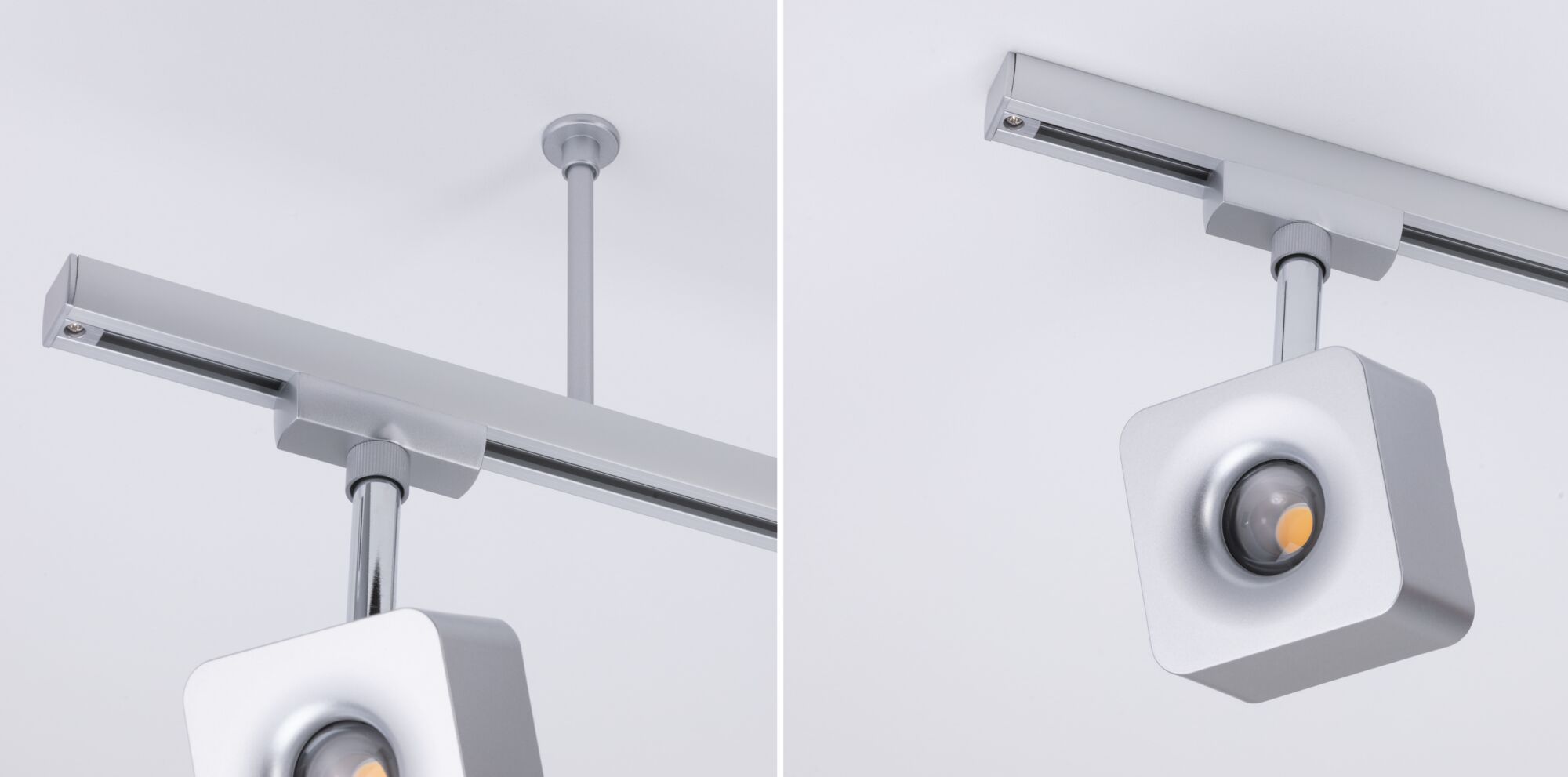 Moderner quadratischer LED-Strahler in Silber aus Metall an Schienensystem für flexible Beleuchtung