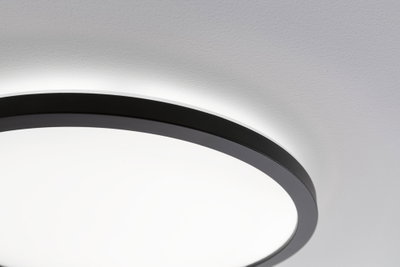 Black round LED ceiling light with white illumination, modern design for living spaces