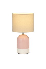 Table lamp with pink ceramic base and beige fabric shade for cozy home lighting
