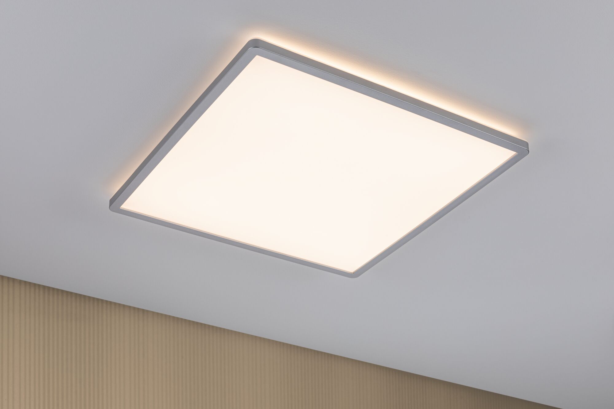 Modern square LED ceiling light with white aluminium frame and warm white light for living spaces