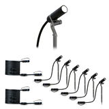 Six black LED garden spotlights with ground stakes and two long connection cables for outdoor lighting.