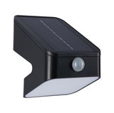 Black solar wall light with motion sensor and white plastic diffuser for outdoor lighting