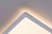 Square white LED ceiling light with warm indirect lighting for modern interior design