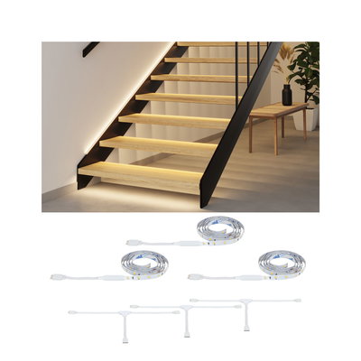 Witte LED-strip met accessoires voor verlichting van houten trap in modern interieur