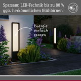 Moderne schwarze LED-Außenleuchten mit warmweißem Licht im Gartenweg, energiesparende Beleuchtung
