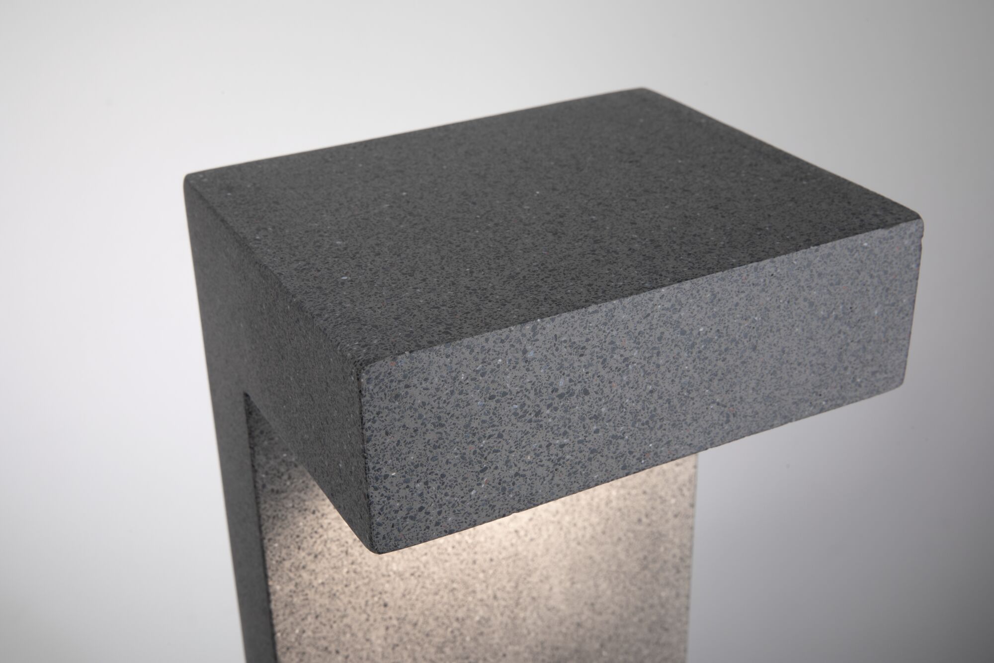 Modern grey stone outdoor post light with integrated warm white LED for garden pathways lighting