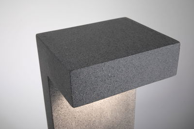 Modern grey stone outdoor post light with integrated warm white LED for garden pathways lighting