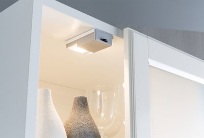 Compact white LED cabinet light made of plastic with switch for kitchen and living room lighting
