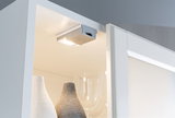 Compact white LED cabinet light made of plastic with switch for kitchen and living room lighting