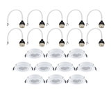 Douze spots encastrés blancs en métal avec câbles assortis pour éclairage LED.