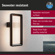 Black outdoor wall light with seawater-resistant surface for durable coastal lighting solutions
