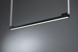 Black LED pendant light with white light strip and fabric suspension for modern interiors.