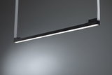 Black LED pendant light with white light strip and fabric suspension for modern interiors.