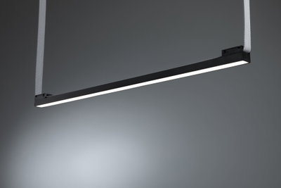Black LED pendant light with white light strip and fabric suspension for modern interiors.