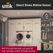 Smart Home bewegingssensor met IP54-bescherming voor vochtige ruimtes en buiten in een moderne wasruimte