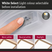 White plastic light colour selector before installation with three wooden LED ceiling lights