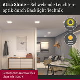 Wohnzimmer mit Atria Shine LED-Deckenleuchten in warmweißem Licht und moderner Einrichtung