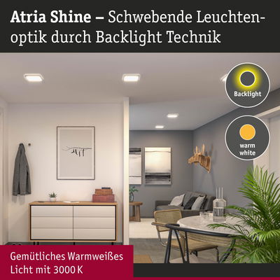 Wohnzimmer mit Atria Shine LED-Deckenleuchten in warmweißem Licht und moderner Einrichtung