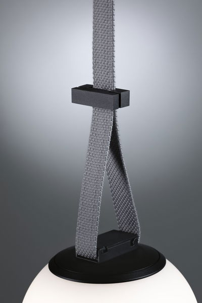 Modern pendant light with black metal holder and grey textile strap, white glass globe
