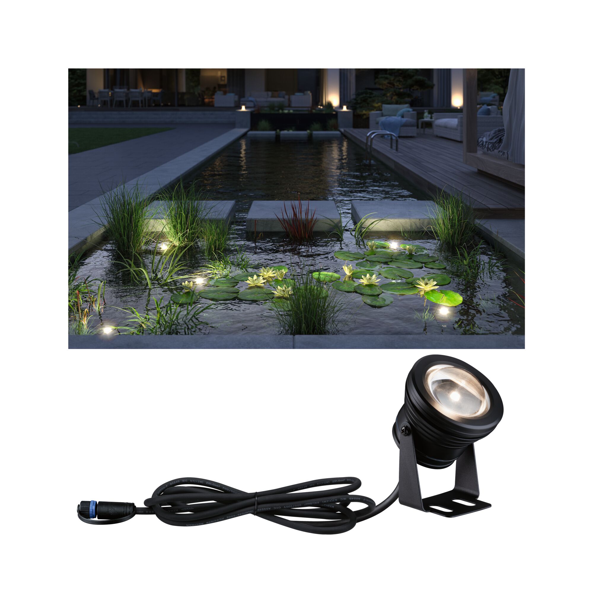 Schwarze LED-Teichleuchte mit Kabel, beleuchtet Wasserpflanzen und Seerosen in Gartenteich bei Nacht