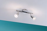 Modern ceiling spotlight in chrome metal with two LED lights for targeted room illumination
