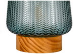 Close-up van grijze gestructureerde glazen lamp op houten voet, decoratieve woonverlichting